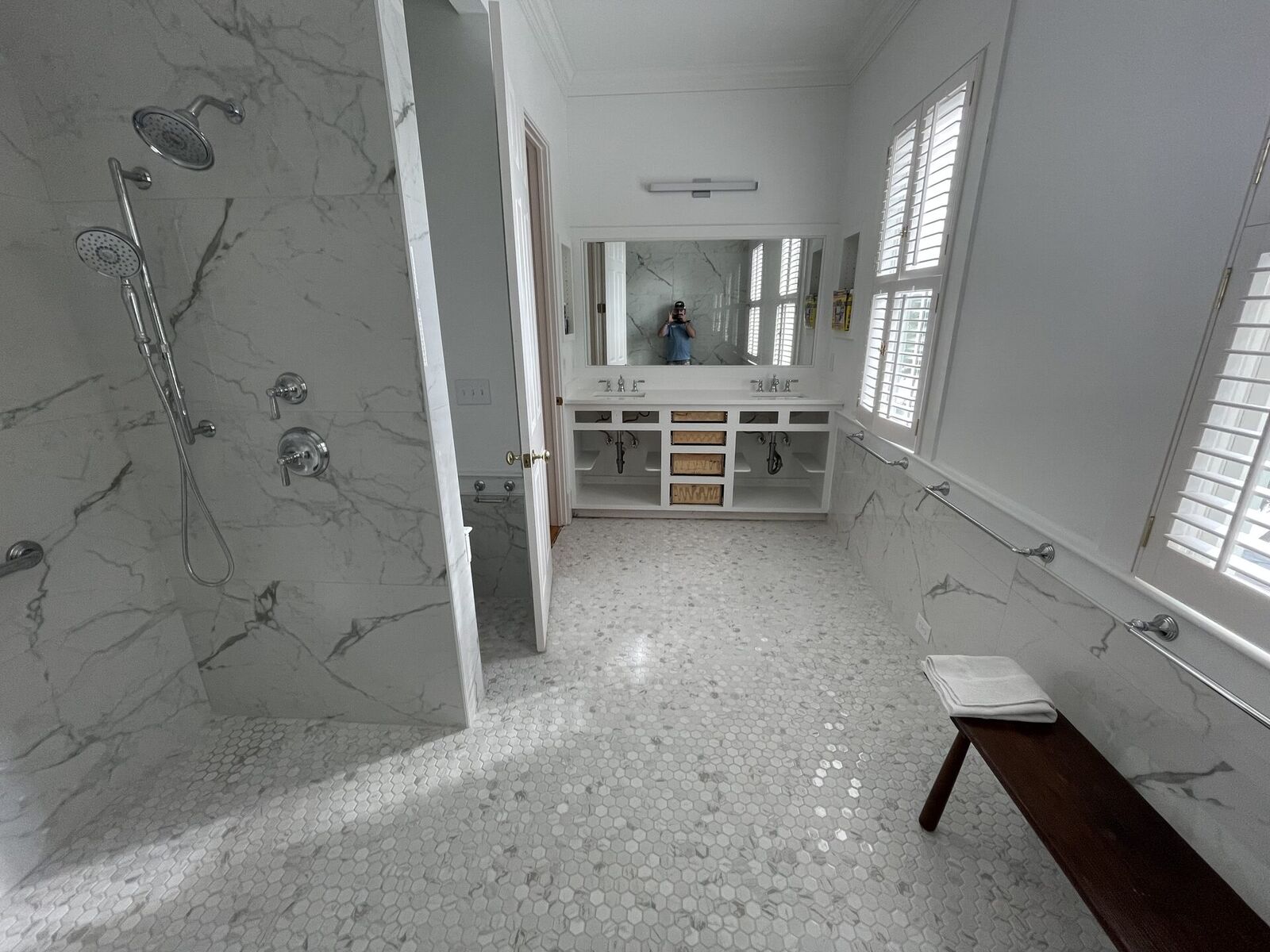 Fully remodeled bathroom with a tiled shower