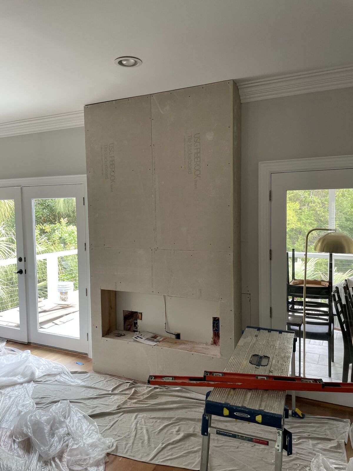 Tile Prep stage of fireplace feature wall by Kickers Low Country Home Creations